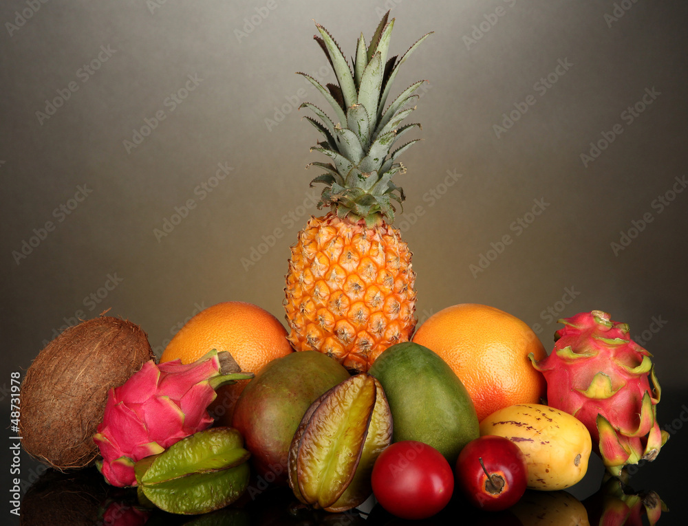 Composition of exotic fruits on colorful background