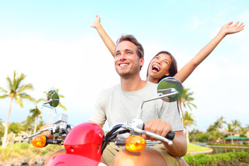 Wall Mural - Happy free freedom couple driving scooter