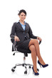 © Viorel Sima - brunette businesswoman sitting in a chair