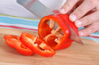 © Di Studio - big knife cutting red pepper