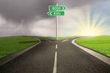 Road Sign Of Good Vs Evil
