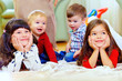 © Olesia Bilkei - group of attentive kids in nursery room