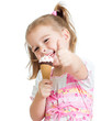 © Oksana Kuzmina - happy kid girl eating ice cream and showing thumb up
