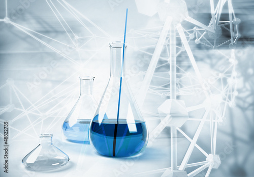 Cuadros en Lienzo Big laboratory flask on abstract science background