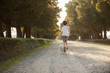 © Mark Edward Atkinson/Tracey Lee/Blend Images - Caucasian boy running on dirt road