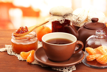 Poster - light breakfast with tea and homemade jam, on wooden table