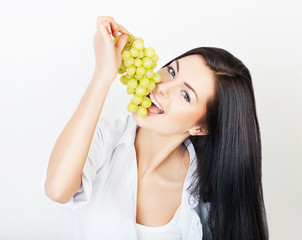 Wall Mural - sexy happy woman eating grape