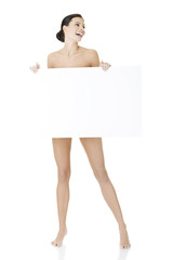 Sexy naked brunette holding empty board