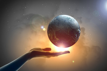 Wall Mural - image of earth planet on hand