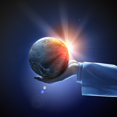 Wall Mural - image of earth planet on hand