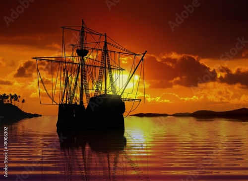 Naklejka nad blat kuchenny Sailboat near coastline during sunset