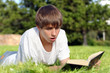 © Sabphoto - Surprised Teenager With a Book