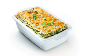 Spinach lasagna with basil. isolated. With clipping path