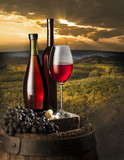 Fototapeta Panele - still life with red wine on vineyard