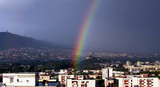 Fototapeta Tęcza - Rainbow over the city