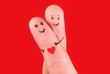 © EMrpize - happy couple concept - a man and a woman hug,painted at fingers