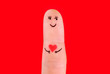 © EMrpize - happy couple concept - a man and a woman hug,painted at fingers
