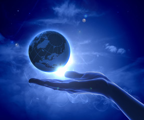 Wall Mural - image of earth planet on hand