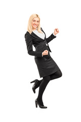 Canvas Print - Full length portrait of a young businesswoman gesturing happines