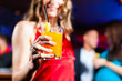 © Kzenon - Woman with cocktail in bar or club