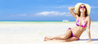 long haired girl in bikini on tropical bali beach