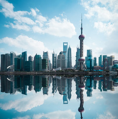 Fototapete - cityscape of modern city with reflection in shanghai