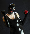 © Richard Semik - woman in latex with chocolate heart