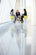 © Monkey Business - Three Businesswomen Meeting Around Table In Modern Office