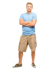 Wall Mural - Attractive young man with arms folded on white background