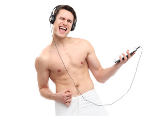 Wall Mural - Man wrapped in towel listening to music