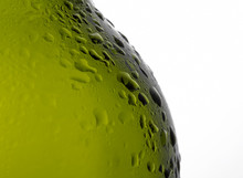 Close Up Image Of Water Droplets On Green Bottle