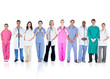 © WavebreakmediaMicro - Happy team of doctors standing together in a line