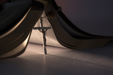Poster - Crucifix propping open the bible