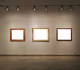 Empty frames in gallery room