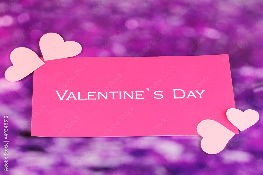 Greeting card for Valentine's Day on purple background