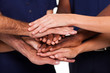 © michaeljung - multiracial hands together to form teamwork