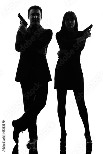 Cuadros en Lienzo couple woman man detective secret agent criminal silhouette