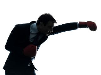 business man boxer with boxing gloves  silhouette