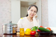 © JackF - weariness mature woman at  kitchen