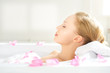 girl relaxing in bathtub