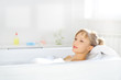 © Anton Maltsev - girl relaxing in bathtub