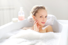 Attractive Girl Relaxing In Bath