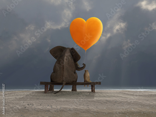 Obraz w ramie elephant and dog holding a heart shaped balloon
