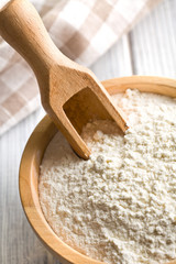 flour in wooden bowl