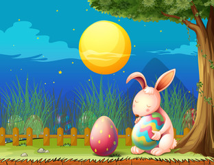 Poster - A bunny in the fence with two easter eggs