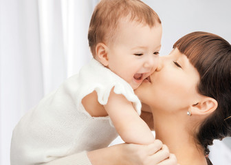 happy mother with adorable baby