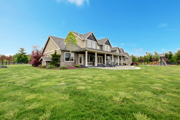 Wall Mural - Large farm country house with spring andscape.