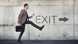 Fototapeta  - Young businessman going to the exit