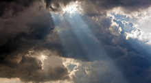 Sun Rays Through Storm Clouds