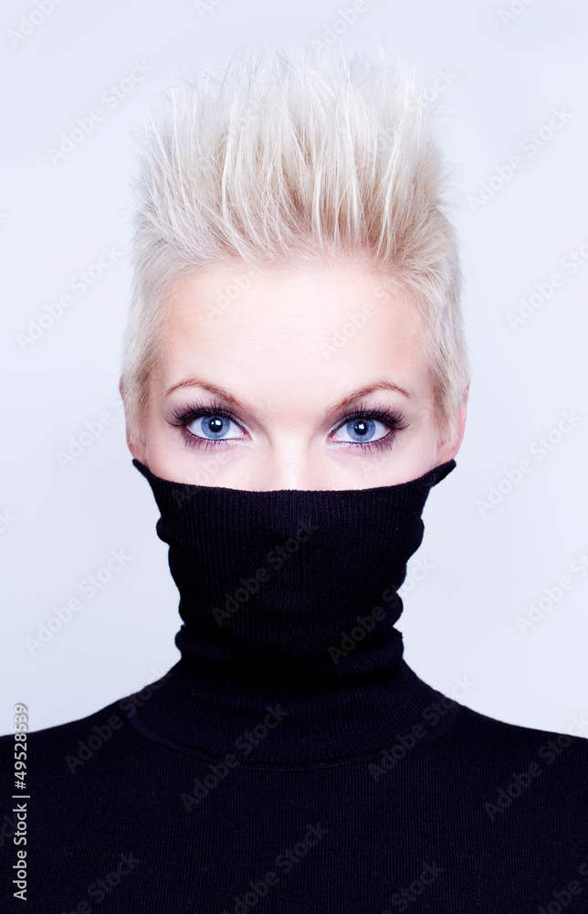 blonde woman with short hair wearing black turtleneck Stock Photo ...